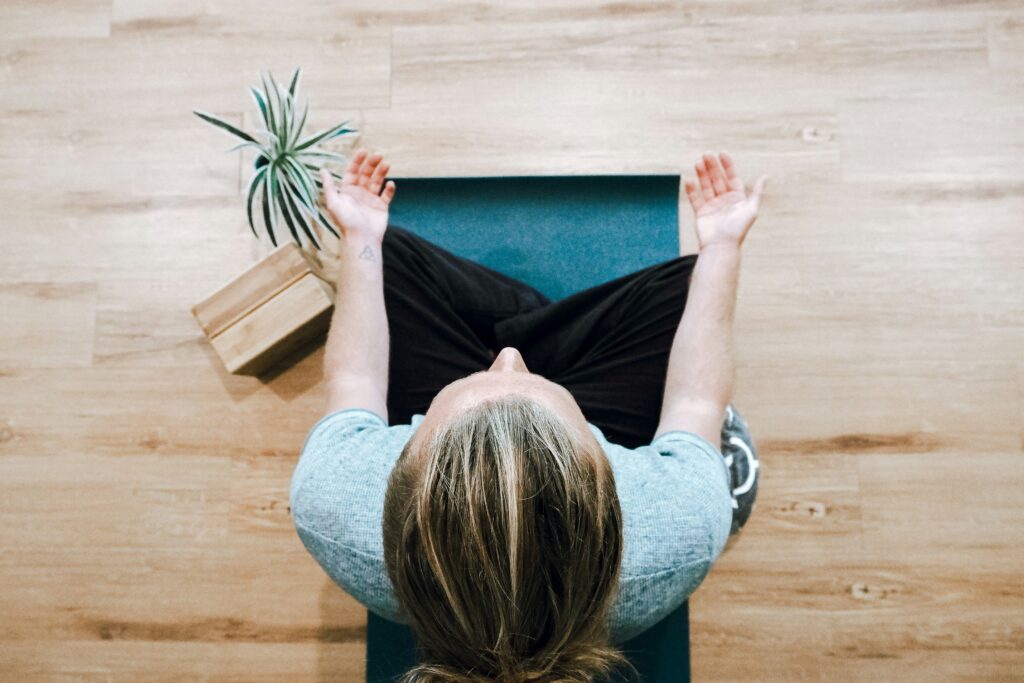 A woman sitting in Tonglen Meditation