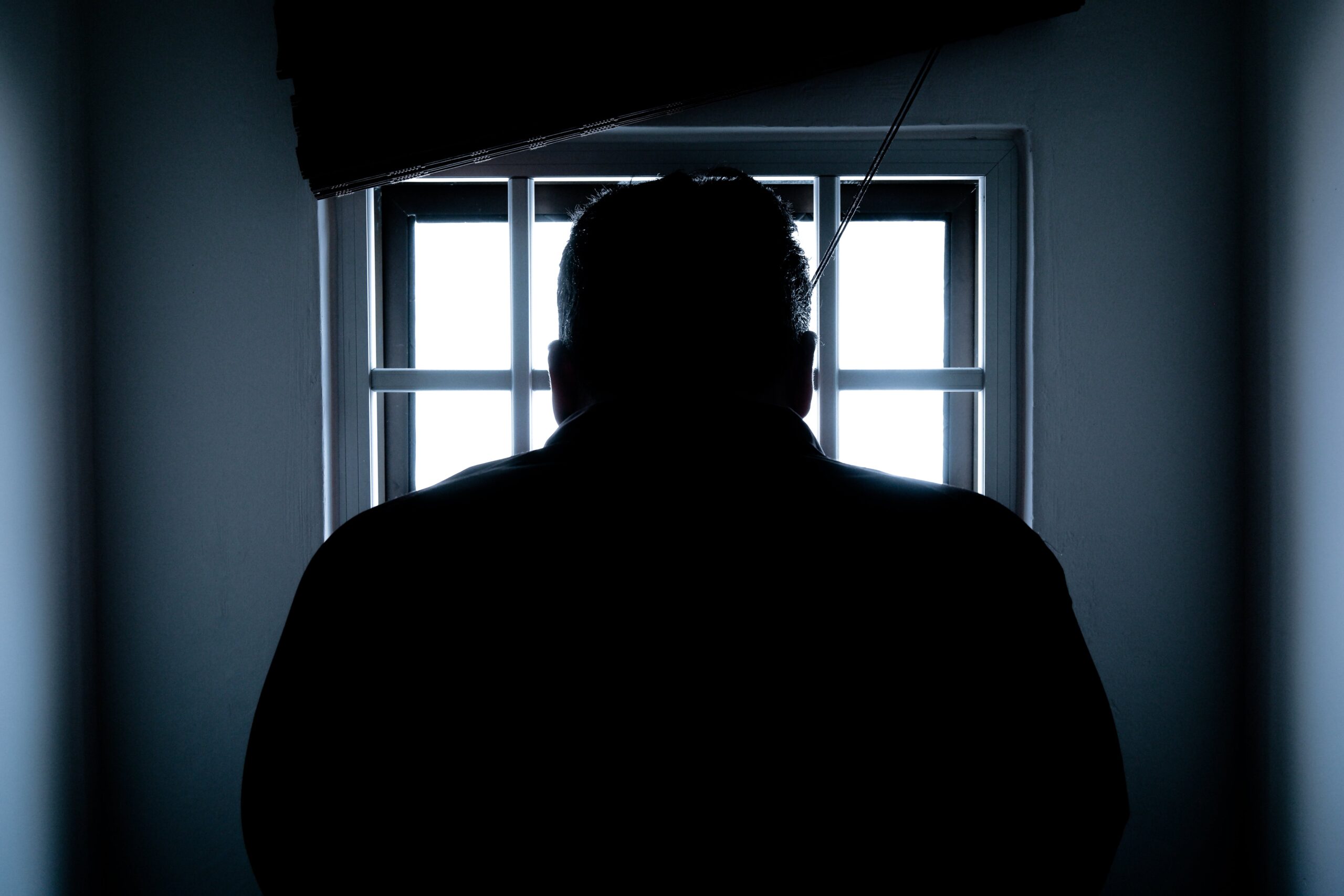 an image of a prisoner in a cell similar to the green mile