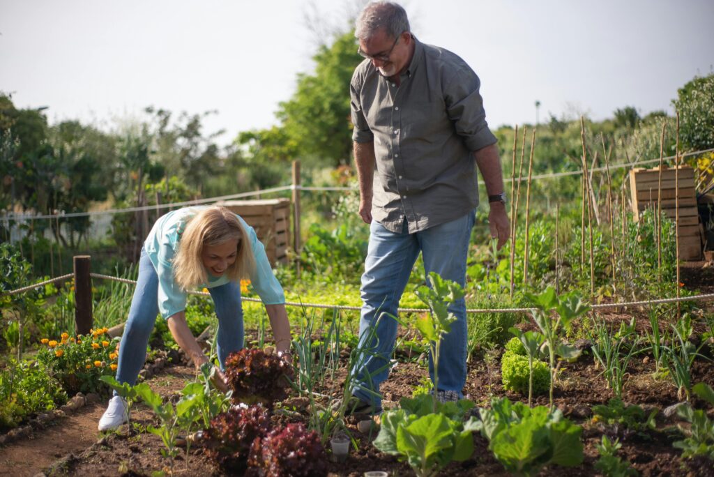 A couple participating in Samu in their own backyard garden.