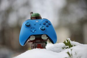 An image of a Star Wars Character holding a video game controller. inspired by Knights of the old Republic or KOTOR and its lessons on Karma