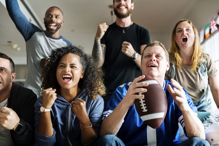 Fans of a Sangha enjoying local professional sports