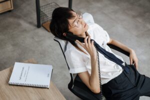 A bored office worker in need of Trataka meditation